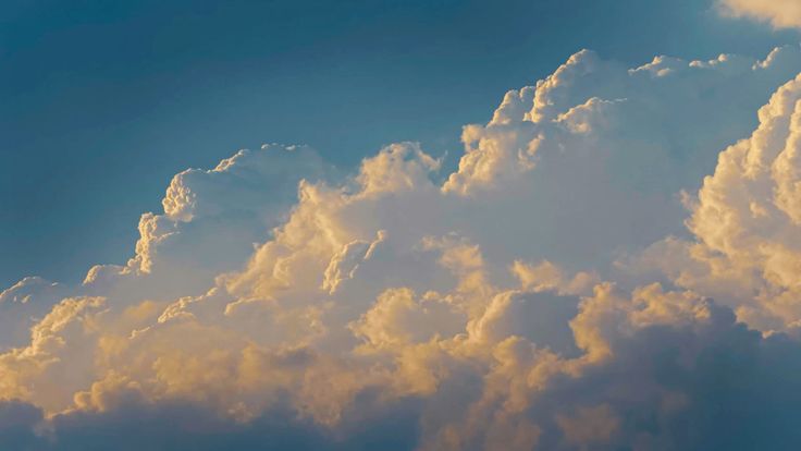 Soft evening clouds across an open sky
